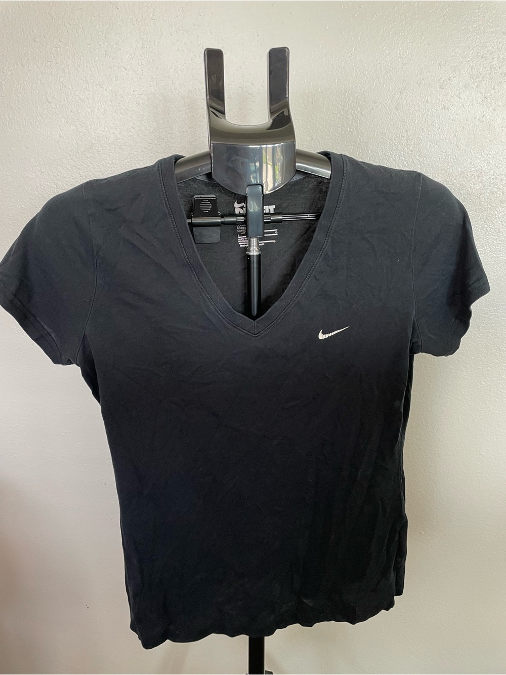 Nike Women’s Black V-Neck Short Sleeve Tee with White Swoosh Logo